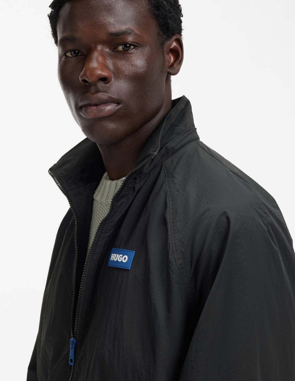 Chamarra rompevientos impermeable con capucha para hombre 5